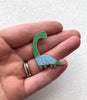 Dino in Sweater Enamel Pin